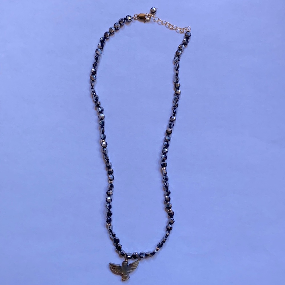 Pearl thunderbird charm, hematite necklace
